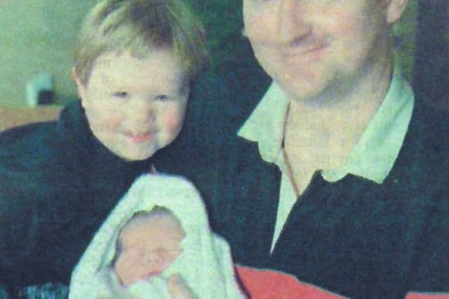 Dad david with the baby and son Joseph