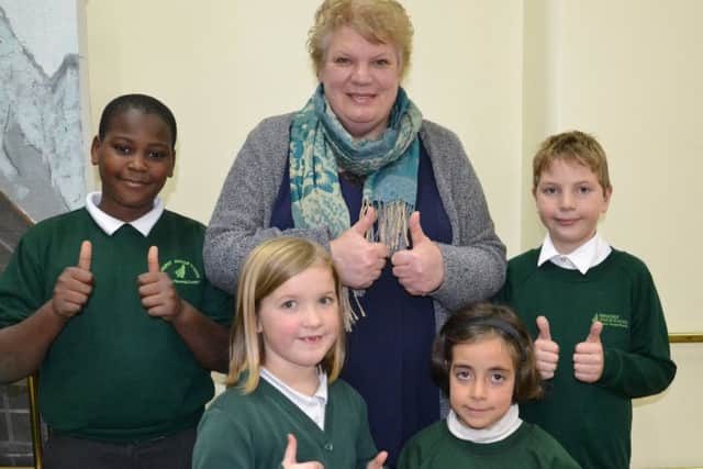Fernhurst Junior School head teacher, Roberta Kirby, with pupils (from left) Simon Olaifa, Tasmyn Leib, Sakina Yousif and Ben Cook