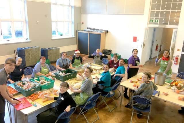 Volunteers and guests at Portsmouth FoodCycle's Christmas feast