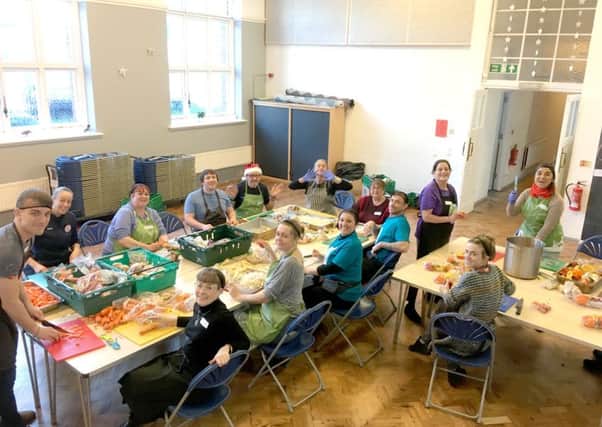 Volunteers and guests at Portsmouth FoodCycle's Christmas feast
