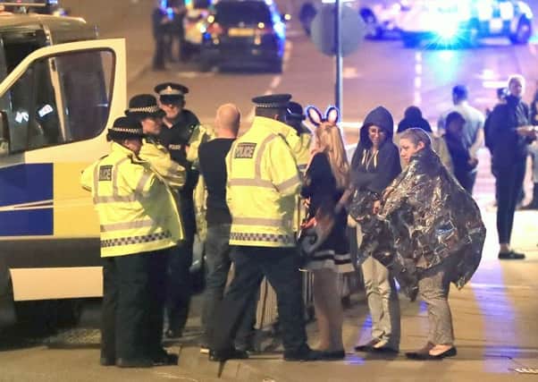 Emergency services at Manchester Arena after the explosion at the venue during an Ariana Grande gig. Picture: Peter Byrne/PA Wire