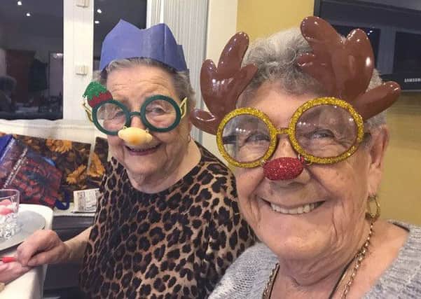 Freda Sheppard, 91, and Joan Forrest, 80, in the winning One Christmas Day picture taken by Tracey Forrest
