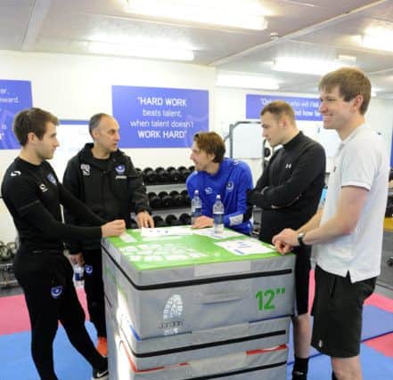 The News' Will Rooney, second right, with, from left, Pompey's Jeff Lewis and Bobby Bacic, plus Express FM's Niall McCaughan and BBC's Andy Moon. Picture: Malcolm Wells