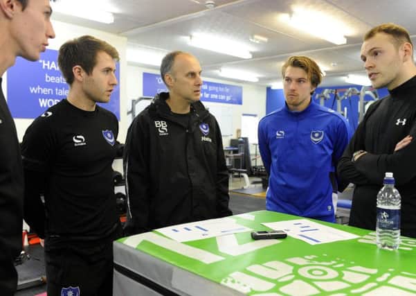 The News' Will Rooney, right, with, from left, Pompey's Ben Spong, Jeff Lewis and Bobby Bacic, plus Express FM's Niall McCaughan Picture: Malcolm Wells
