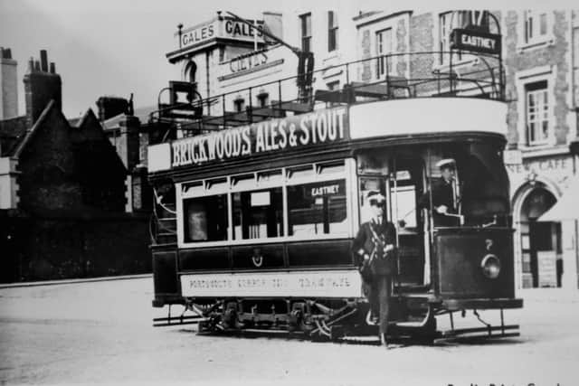 Car number seven on The Hard, Portsea, outside the dockyard gates about to leave for Eastney. Undated.