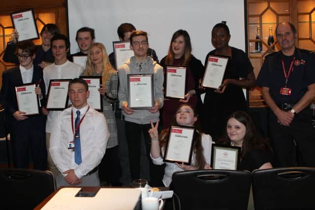 Youngsters receive their Level One Employment, Teamwork and Community Skills qualification certificates from Hampshire Fire and Rescue. Picture: Simon Carr