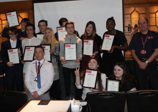 Youngsters receive their Level One Employment, Teamwork and Community Skills qualification certificates from Hampshire Fire and Rescue. Picture: Simon Carr