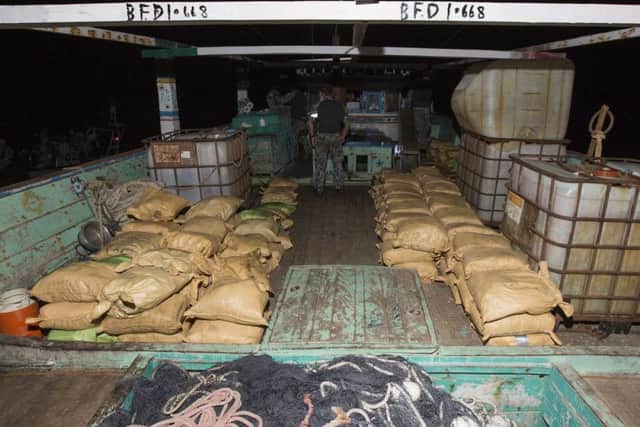Parcels of seized narcotics lay on the deck of a smuggling vessel as HMAS Warramungas boarding team conduct an illicit cargo seizure during operations in the Middle East. Picture: Commonwealth of Australia 20180102