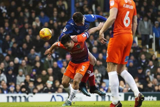 Oli Hawkins scores his second against Northampton. Picture: Joe Pepler