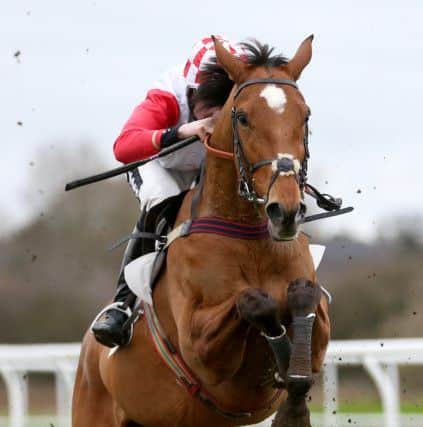 Tom Cannon and Hit The Highway on their way to victory at Leicester