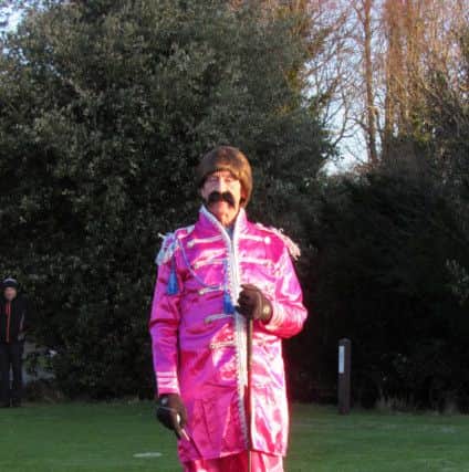 Mens' captin Neil Chalmers arrives dressed as Ringo Starr