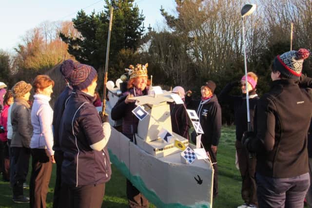Isabel arrives at the Captains' Drive in her warship