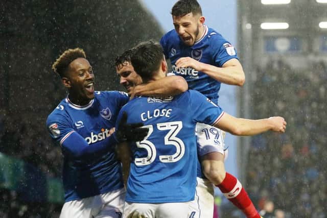 Pompey celebrate Ben Closes goal in the 2-1 win over AFC Wimbledon on Boxing Day  a game that attracted 18,644 fans to Fratton Park