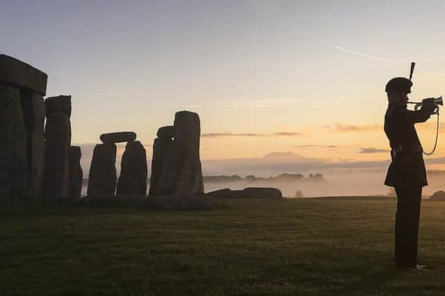 WO2 Daniel Harmer RLC - LCpl Yassen from the Band of the Rifles plays Last Post in 13 recognisable location around the UK. Here he is at Stonehenge