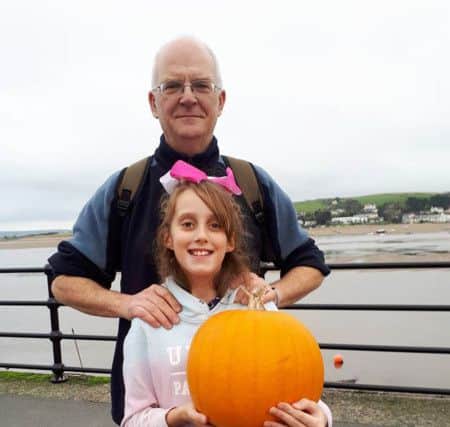 Ken Ebbens and his granddaughter Chloe Fowler on a family holiday in north Devon
