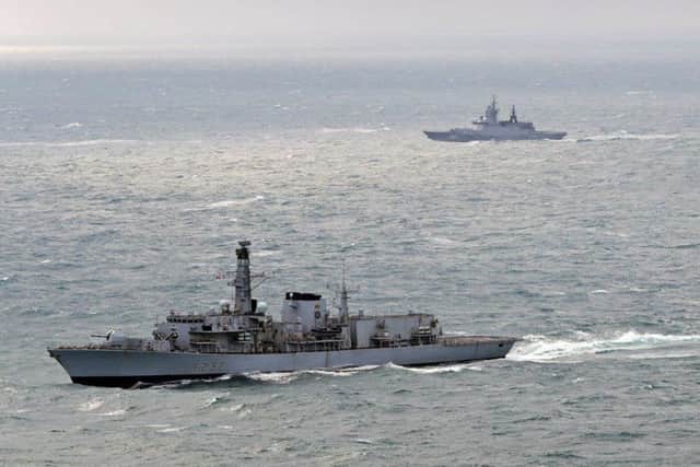 HMS Westminster (foreground) with the Russian frigate Boiky in the background