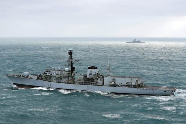 HMS Westminster (foreground) with the Russian frigate Boiky in the background