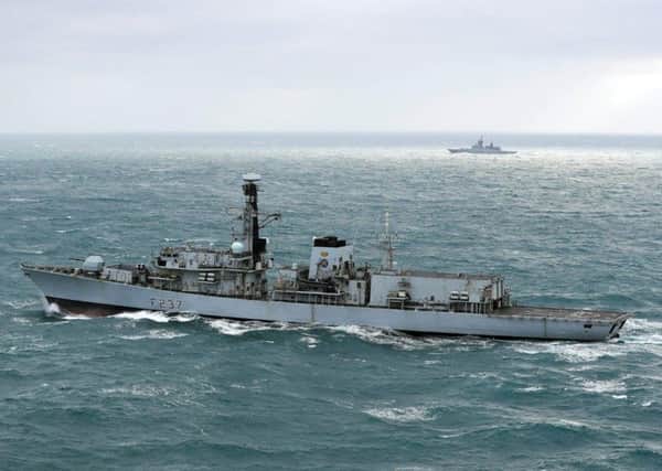 HMS Westminster (foreground) with the Russian frigate Boiky in the background