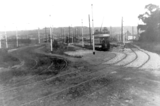 Is there anyone who can work out which track this tram is on?