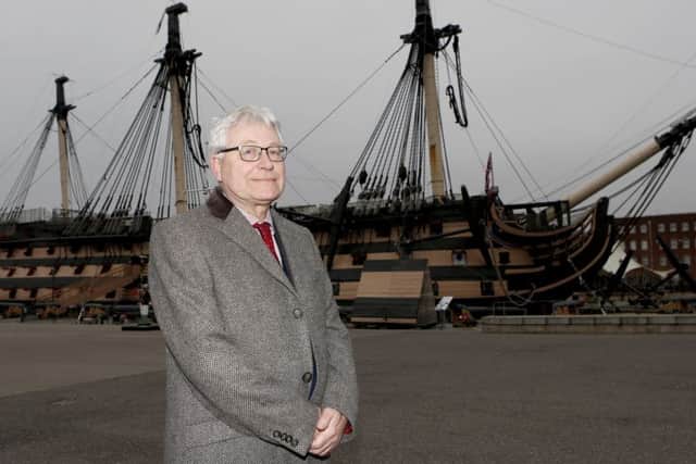Professor Dominic Tweddle in front of HMS Victory