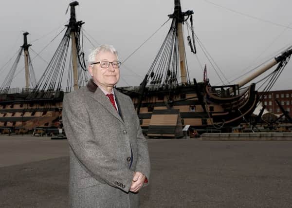 Professor Dominic Tweddle in front of HMS Victory