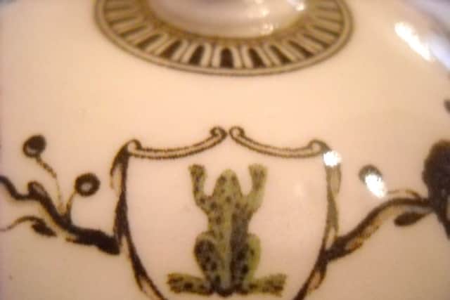 A picture of the frog motif from a facsimile piece of the Frog Service commissioned by Catherine the Great in 1773.