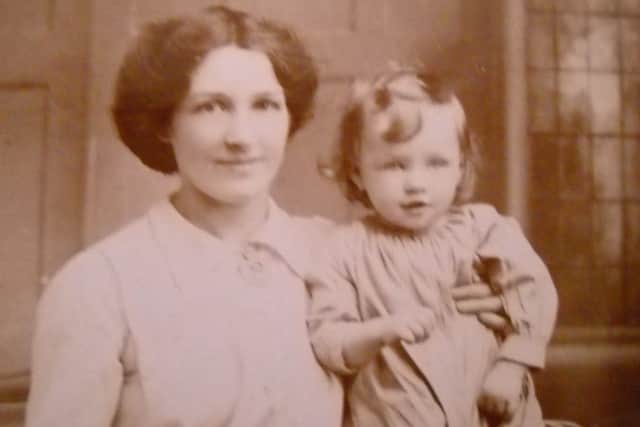 Florence Hart, of Jessie Road, Southsea, with her son at the time of the historic act of parliament which gave some women the right to vote.