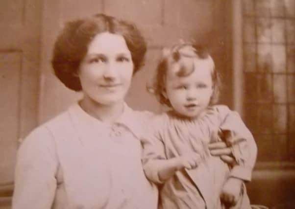 Florence Hart, of Jessie Road, Southsea,  with her son at the time of the historic act of parliament which  gave  some women the right to vote.
