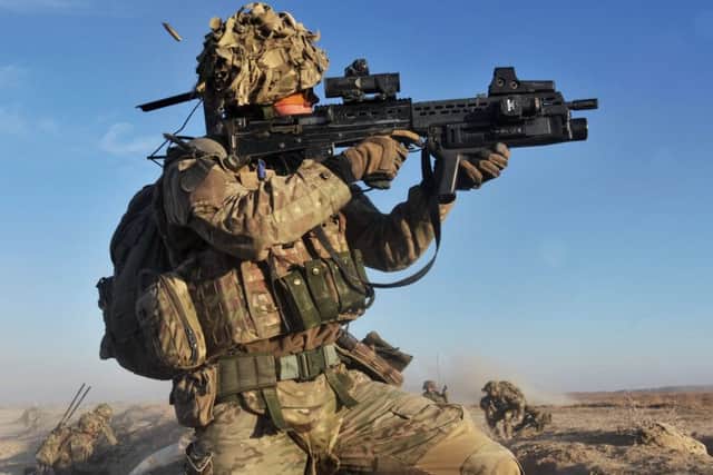 A soldier with the 4th Mechanised Brigade is pictured engaging the enemy during Operation Qalb in Helmand, Afghanistan. PPP-151019-121639001
