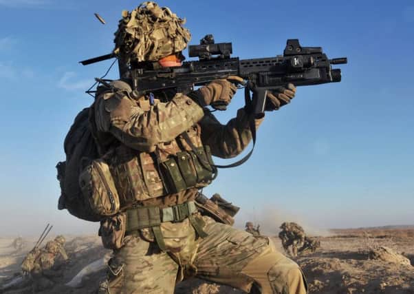 A soldier with the 4th Mechanised Brigade is pictured engaging the enemy during Operation Qalb in Helmand, Afghanistan. PPP-151019-121639001