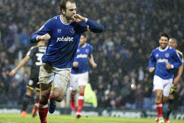 Brett Pitman celebrates scoring against AFC Wimbledon. Picture: Joe Pepler