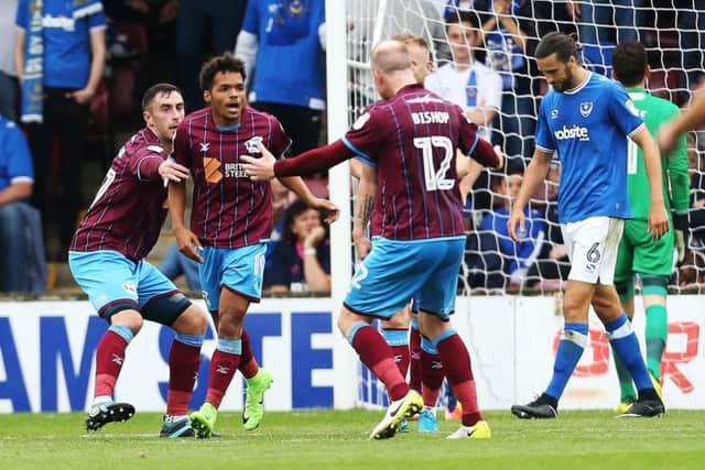 Duane Holmes celebrates his goal against Pompey at Glanford Park in September. Picture: Joe Pepler