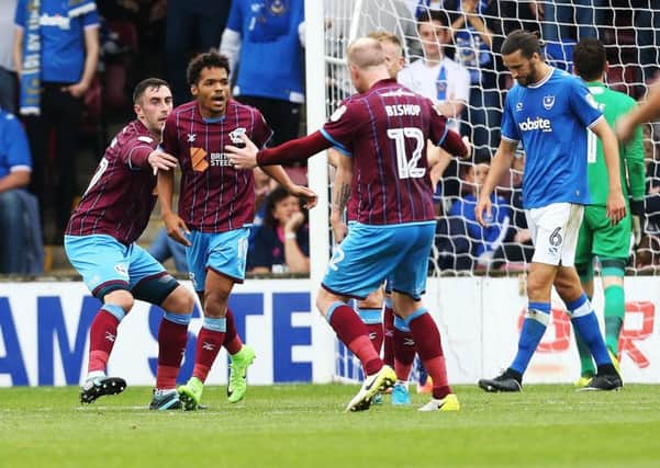 Duane Holmes celebrates his goal against Pompey at Glanford Park in September. Picture: Joe Pepler