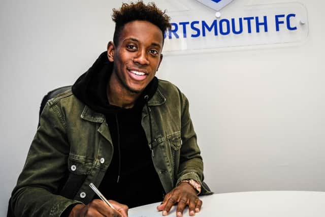 Jamal Lowe signs his new deal. Picture: Colin Farmery