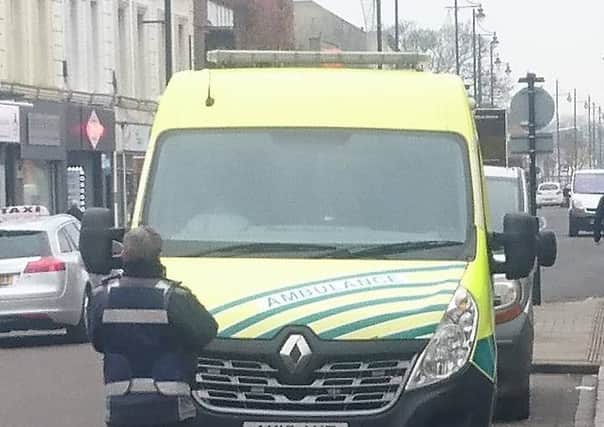 A ticket officer issuing a parking ticket to an ambulance in West Street, Fareham. Picure: Ben Trickett BrUaLoD4ZsuY4PmyaS-F