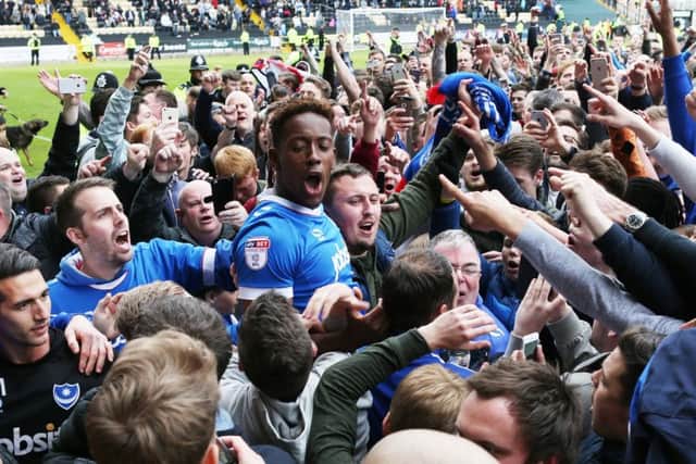 Jamal Lowe scored twice as Pompey clinched promotion at Notts County last season. Picture: Joe Pepler