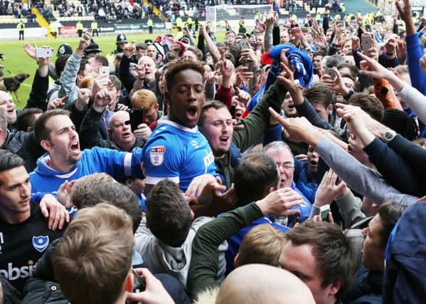 Jamal Lowe scored twice as Pompey clinched promotion at Notts County last season. Picture: Joe Pepler