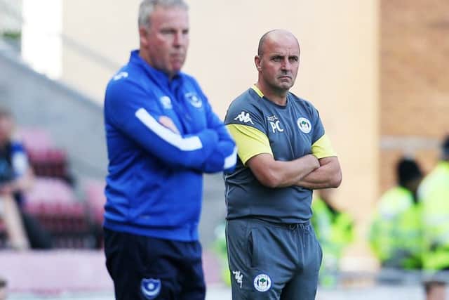 Kenny Jackett, left, with Wigan boss Paul Cook
