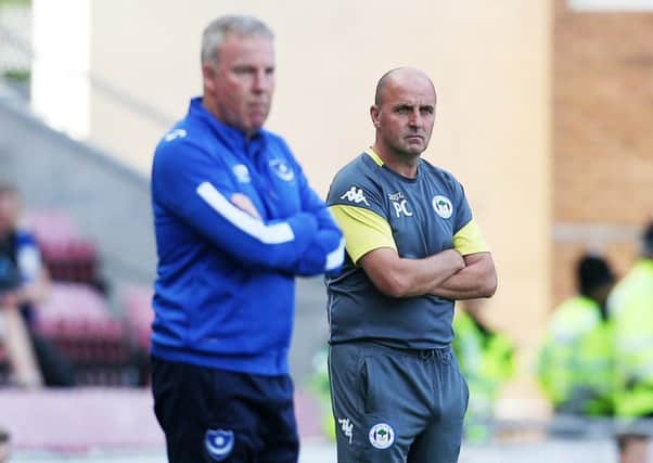 Kenny Jackett, left, with Wigan boss Paul Cook