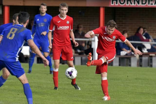 Miles Everett opened the scoring for Horndean against Petersfield. Picture: Neil Marshall