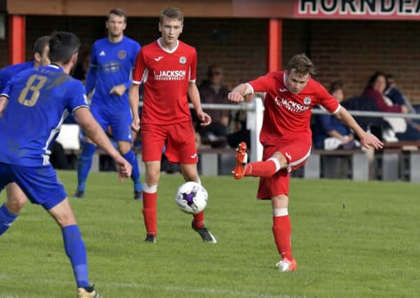 Miles Everett opened the scoring for Horndean against Petersfield. Picture: Neil Marshall