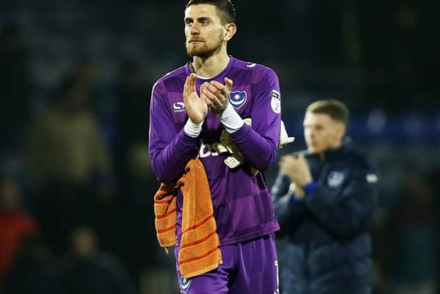 Luke McGee applauds the Pompey fans after the game. Picture: Joe Pepler