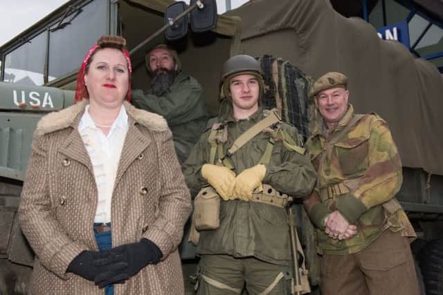 From left, Rosie Rixon, Richard Rixon, Jack Rixon and Gary Lamsdale from Hayling Island, all members of Solent Overlord Executive, with Richard's 1941 GMC CCKW swb truck Picture: Duncan Shepherd (180082-004)