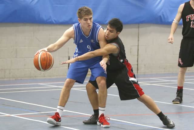 Portsmouth Fury's Aaron Ribera, right, in action against the Smugglers before Christmas. Picture: Habibur Rahman