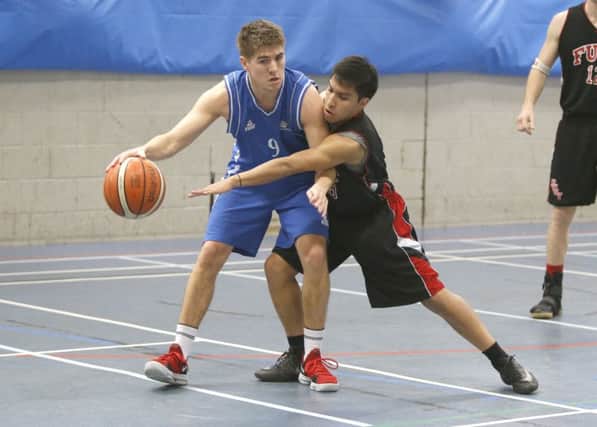 Portsmouth Fury's Aaron Ribera, right, in action against the Smugglers before Christmas. Picture: Habibur Rahman