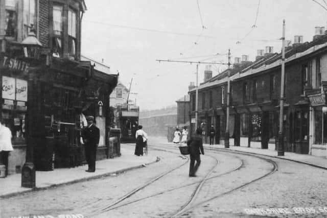 THEN: Full of life and shops galore  the eastern end of Highland Road in Edwardian days with Kassassin Street on the right.  Picture: Barry Cox Collection