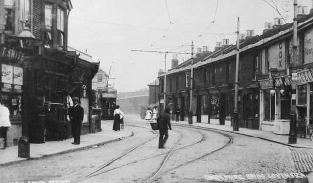 THEN: Full of life and shops galore  the eastern end of Highland Road in Edwardian days with Kassassin Street on the right.  Picture: Barry Cox Collection
