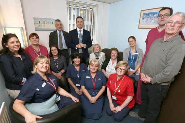 Chief Executive Mark Cubbon (centre), with surgeons, nurses and volunteers in the Patient Quiet Room. Picture: Habibur Rahman