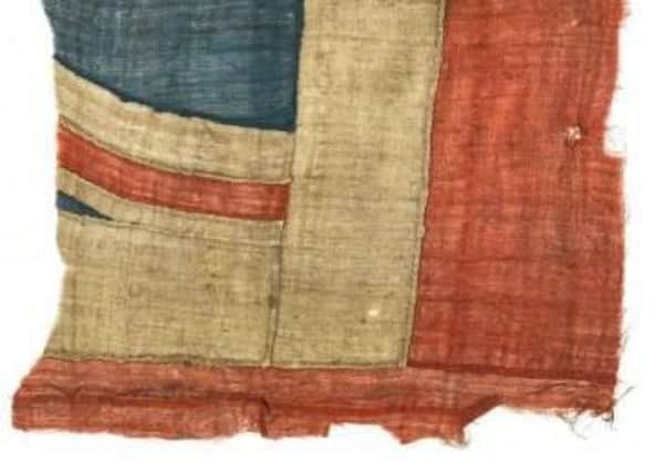 The fragment from the Union Jack believed to have flown on board HMS Victory at the Battle of Trafalgar. Credit: Sotheby's