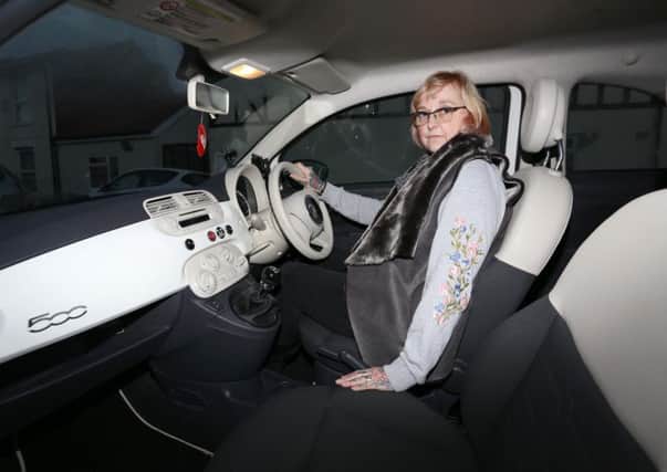 Vicky Beckett back in her car after it had been professionally cleaned     

Picture: Habibur Rahman